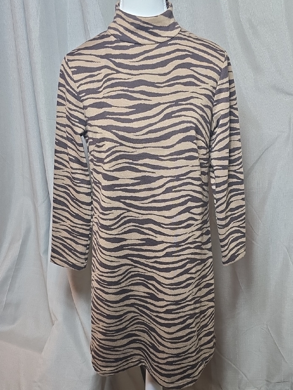 Tuckernuck Ellie Striped Mock Neck Knit Dress in Tiger Animal Print. 